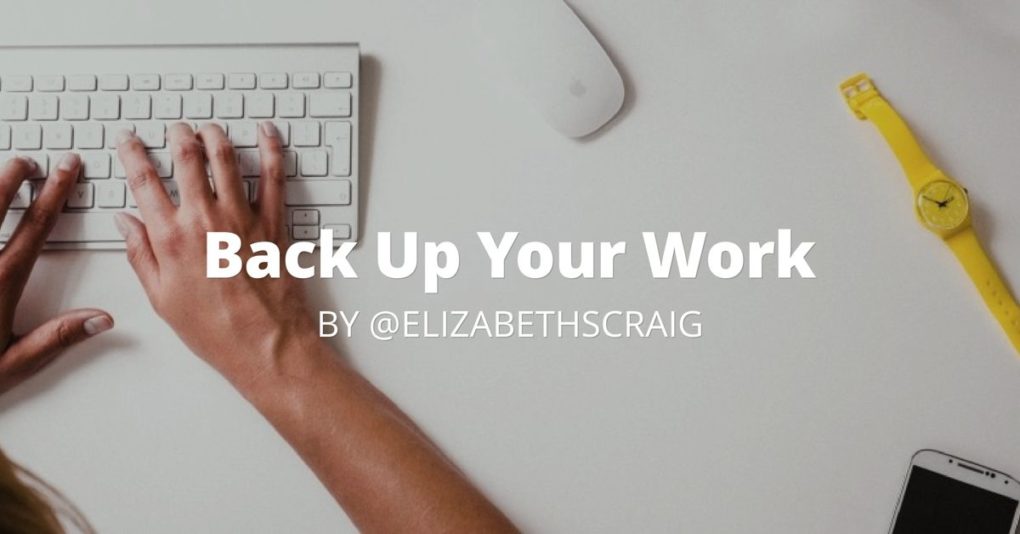 Aerial view of hands typing on a keyboard with a white mouse in the upper right. Superimposed on the photo is the post title, "Back Up Your Work." 