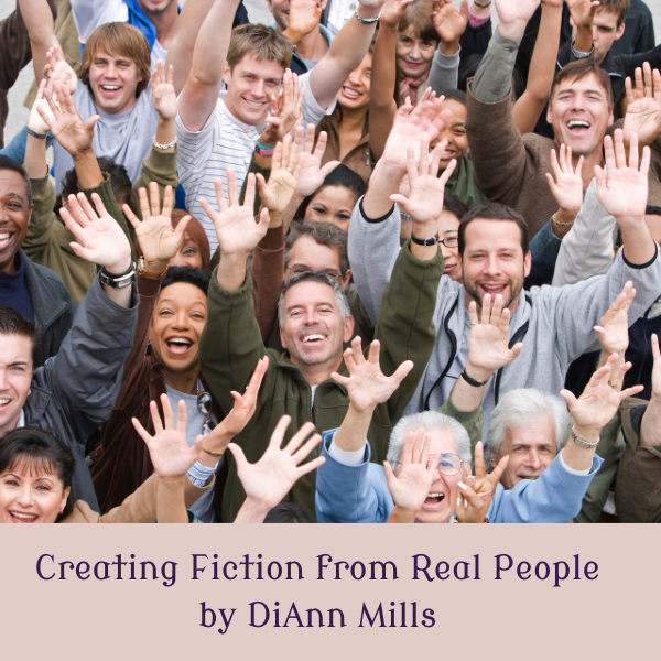 Group of people smiling and raising their hands